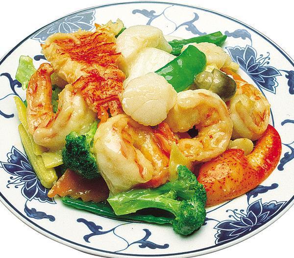 57. Seafood Delight · Jumbo shrimp, scallop, immitation crab, and squid with mixed vegetable in white seafood sauce. With a side of rice.