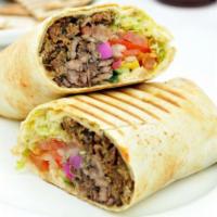 Greek Gyro Wrap · Lamb/Beef , or Chicken , Cucumber Sauce, Lettuce, Tomato, Cucumber , and onion