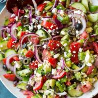 Greek Salad · Feta cheese, Tomato, cucumber, onion, Kalamata olives, olive oil and vinegar.