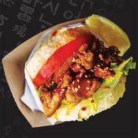 Chicken KoJa · Korean BBQ chicken, lettuce, tomato, spicy gochujang sauce, sesame seeds, lemon wedge.