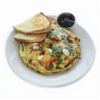 Burgundy Omelette · Three egg omelet, spinach, mushrooms, Chevre goat cheese, sun-dried tomatoes, mushrooms, chi...
