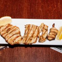 Pollo al Limon · The lightest entree on our menu. A grilled, skinless, boneless breast of chicken, lightly ba...