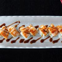 BBQ Salmon · Whole roll. California roll base with seared salmon on top. topped with teriyaki sauce. 8 pi...