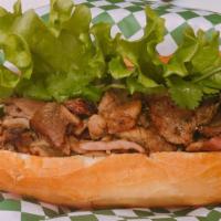 Pork Sandwich · French bread served with pho ever sauce.