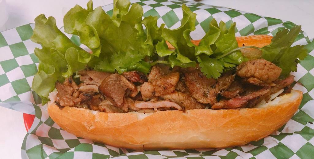 Pork Sandwich · French bread served with pho ever sauce.