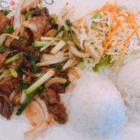 Mongolian Beef Wok · Served with steamed rice and salad.