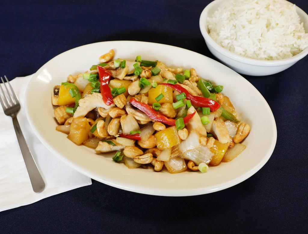 36. Pad Him Ma Parn · A popular cashew nut stir-fry with onion, pineapple, bell peppers, mushrooms, baby corns and spicy toasted dry chilies. Include with rice.