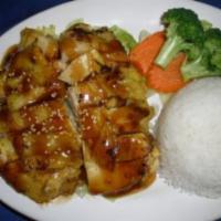 Chicken Teriyaki · Grilled chicken with sweet teriyaki sauce served with rice and steamed vegetables.