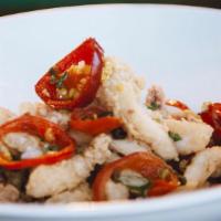 Calamari · Fried cherry pepper, fried capers, lemon, garlic aioli. Extra sauce for an additional charge.