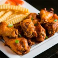 Chicken Wings · Hot, medium or mild, celery, carrot, bleu cheese or ranch, fries. Comes with a choice of dre...