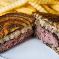 Patty Melt  · Grilled onions on toasted rye, Swiss cheese, fries.