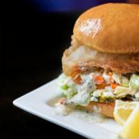 Northwest Fish Sandwich · Beer battered cod, homemade tartar, old bay slaw, lettuce, tomato, pickle, fries.