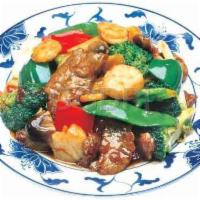 23. Chu Chow Three Delight · Tender sliced beef, chicken and scallop sauteed with mushroom and snow pea pods. Served with...