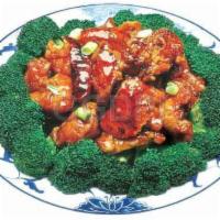 24. Jordan Chicken · General Tso's. Slightly fried boneless chicken in ginger sweet and sour sauce. Served with w...