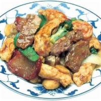 28. Star House Happy Family · Large shrimp, chicken, beef, pork with assorted mixed vegetables in brown sauce. Served with...