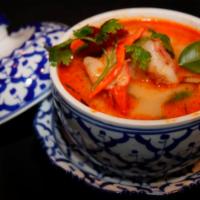 Tom Yum Koong Soup  · A signature Thai soup with shrimp, straw mushrooms, fresh Thai herbs, lemon juice and chili ...