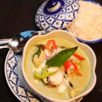 Green Curry Chicken · Green curry with chicken in coconut milk with eggplant, fresh chilies and Thai basil.