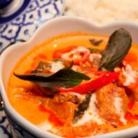 Roast Duck Red Curry · Red curry with roast duck in coconut milk with cherry tomatoes, pineapple and Thai basil.
