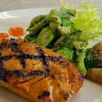 Salmon · Sauteed broccolini, brussel sprouts, roasted potatoes, topped with a chili honey glaze