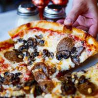 Gianna Pizza · Fennel sausage, mushrooms, pine nuts, and mozzarella.