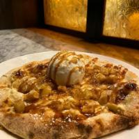 Apple Pie Pie · Personal-sized pizza with ricotta cream, apple compote, Graham crumble, caramel sauce, and v...