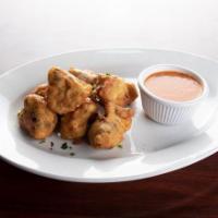 Cauliflower Fritti · Fresh cauliflower, lightly battered and fried. Served with a side of Russo’s homemade marina...