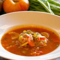 Vegan Minestrone Soup · Fresh garden vegetables, cannellini beans, and penne pasta, in a savory vegetable broth.