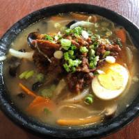 Korean Ramen · Korean ramen noodle topped with egg, cabbage, onion, carrot, topped with scallion. Not spicy...