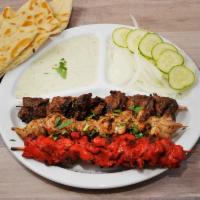 Mixed Karachi Grilled Kabab Platter · 1 beef, 1 tandoori chicken and 1 Mediterranean chicken kabab marinated over 24 hr. in exotic...