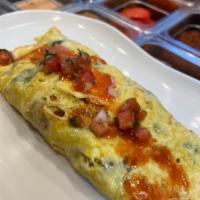 Bacon and Pepper Jack Omelet · Smoked bacon, pepper jack, grilled onion, pepper and tomato.