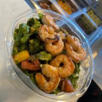 Mango Shrimp Salad  · Romaine lettuce, grilled shrimp, avocado, cucumber, mango, red onions, tomatoes, raspberry b...