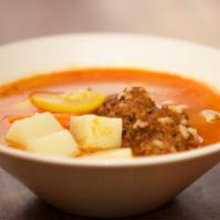 Albondigas Soup · Meat balls and vegetables soup, served with tortillas.