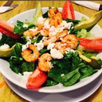 Shrimp Salad · Grilled shrimp served over a bed of lettuce with queso fresco and our special red wine dress...
