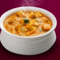 Paneer Butter Masala  · Cheese cubes sauteed in butter and blend of spices. 