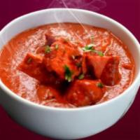 Chicken Tikka Masala  · Boneless grilled chicken cooked with tomato, cream and special spices. A divine buttery tast...