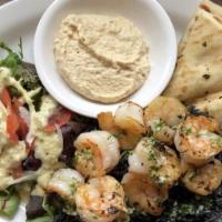 Shrimp Plate · Grilled shrimp over squid ink rice with hummus, pita and side salad. Includes tomato, onion,...