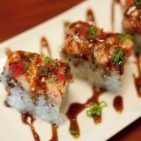 8 Pieces Hidden Dragon Roll · In: Crab, avocado. Top: Seasoned salmon and special mayo on top with eel sauce, masago and s...