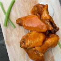 Chicken Wings · Your choice of Buffalo, honey chipotle or dry rub.