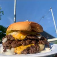 Triple Bbe Burger with Fries  · 3 smashed beef patties, American cheese, raw onion, pickles, house burger sauce, on a Martin...