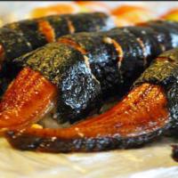 11. Black Dragon Roll · Fried shrimp, cucumber, avocado, eel, sesame seed and eel sauce.