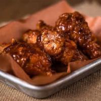 Spicy Wings · 6 pieces. Crispy deep-fried jumbo party wing size served with spicy flavor sauce.