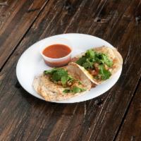 Breakfast Tacos · With egg, jalapeno relish cilantro and pepper Jack cheese. Served on corn tortillas.