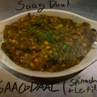 Saag Daal · Spinach and Yellow Lentil mix cooked together with Ginger, Garlic , Caramelized Onions ,& a ...