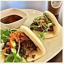 BB3. Grilled Chicken Bao Bun · 3 pieces Bao bun with grilled chicken, jalapeno, carrot pickled and cilantro.  Service with ...