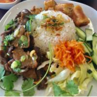 R2. Rice with Grilled Pork Bowl · Grilled pork, cilantro, carrots, cucumbers, lettuce, crushed peanut, fried onion