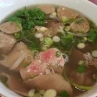 P1. V's Combo Noodle Soup · Pho dac biet. Thin sliced eye round steak, brisket, and meatballs.
**The thin-sliced eye rou...