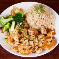 H7. Hibachi Chicken and Shrimp · Served with clear soup, house salad, vegetables and a choice of rice.
