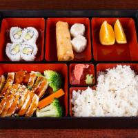 B2. Chicken Teriyaki Bento Box · Served with miso soup, house salad, fried pork gyoza, spring roll, 8 pieces California roll ...