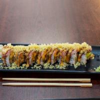 32. Amazing Roll · Tempura crab meat, avocado, eel, topped with seared tuna, eel sauce, spicy mayo & tempura fl...