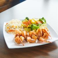 Grilled Garlic Shrimp · Served with Veggies and Rice.